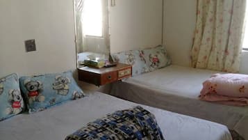 Quadruple Room | Bed sheets