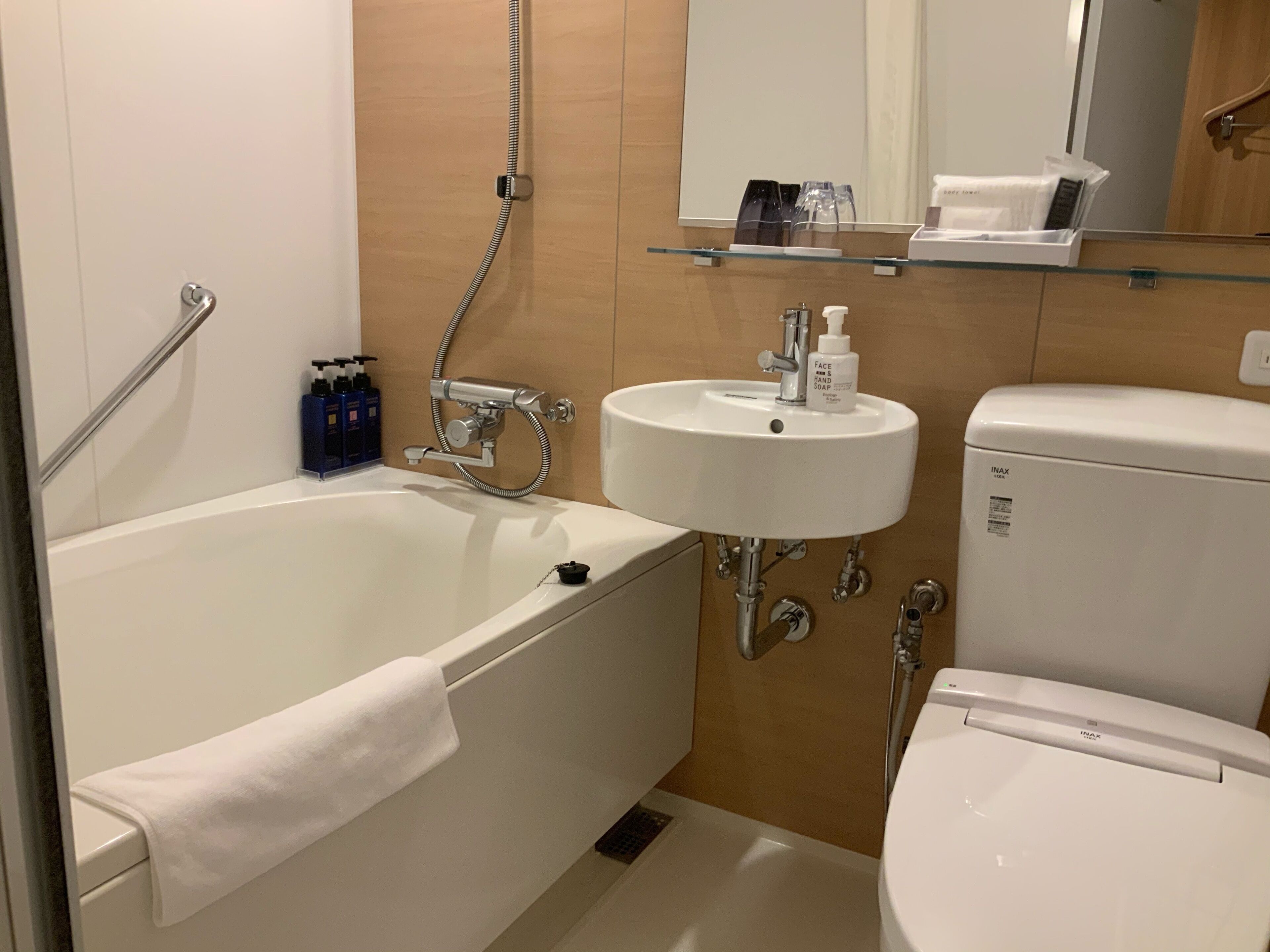 free toiletries, hair dryer, slippers, electronic bidet