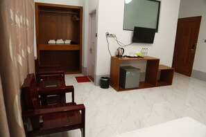 Family Room | Living area | 32-inch flat-screen TV with satellite channels, TV - Mandalar May One Hotel (Mandalay)