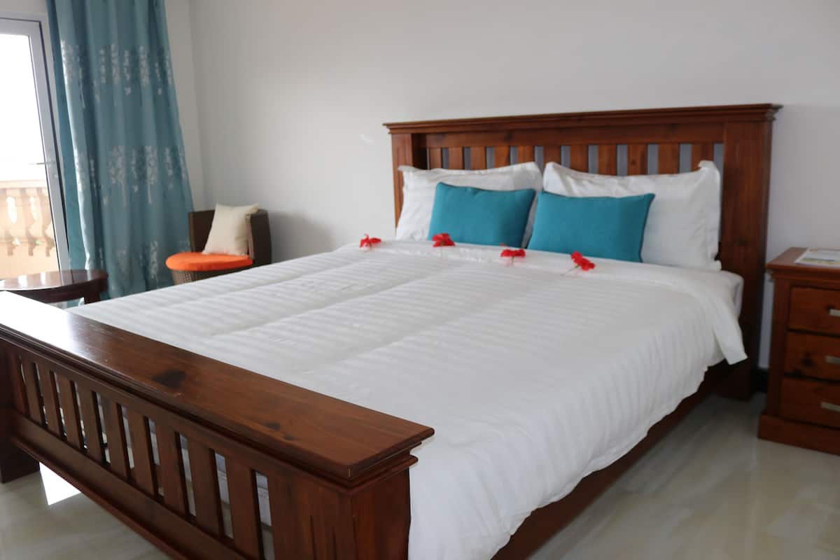 Standard Room, Balcony, Pool View | Hypo-allergenic bedding, in-room safe, soundproofing, free WiFi