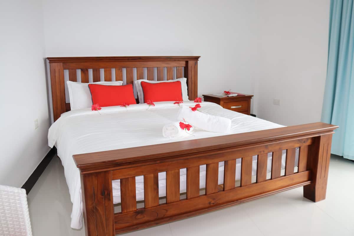 Family Room, Multiple Beds, Patio, Sea View | Hypo-allergenic bedding, in-room safe, soundproofing, free WiFi