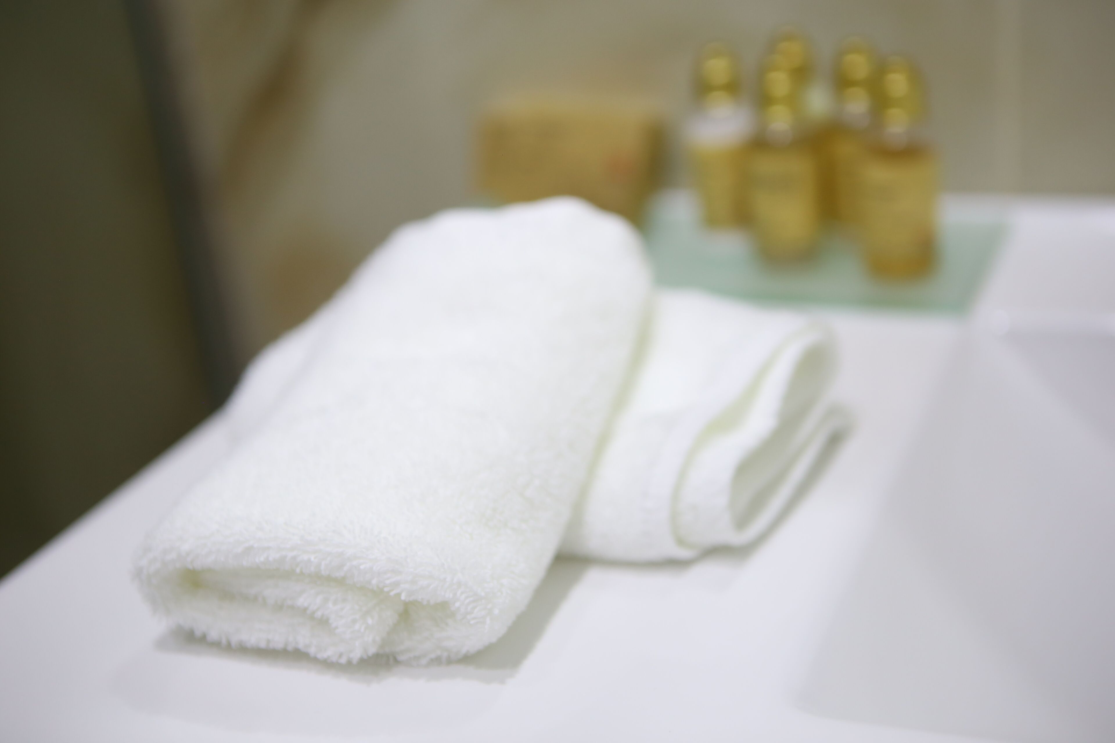 deluxe double room | bathroom amenities | free toiletries, hair dryer, slippers, towels