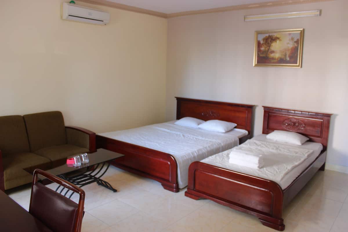 Standard Triple Room | Minibar, desk, iron/ironing board, free WiFi