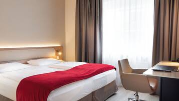 Hypo-allergenic bedding, in-room safe, desk, laptop workspace