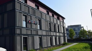 A modern building with a sign reading "REPUBLICS". - House of Records (Munich)