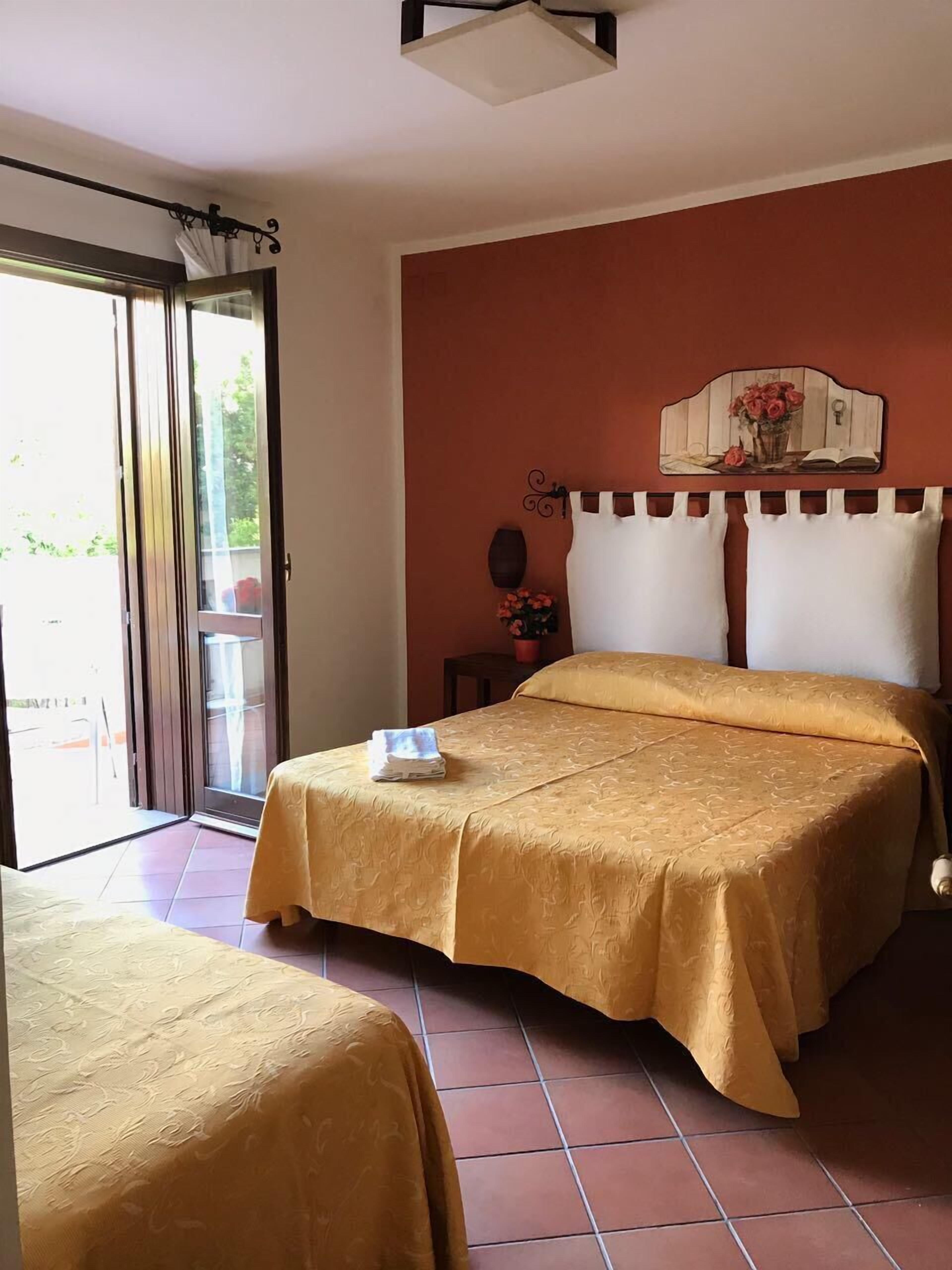 Triple Room, Private Bathroom (External) | Desk