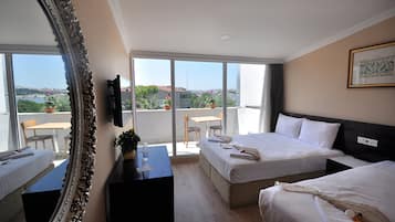 Deluxe Triple Room, Sea View | Egyptian cotton sheets, premium bedding, minibar, desk