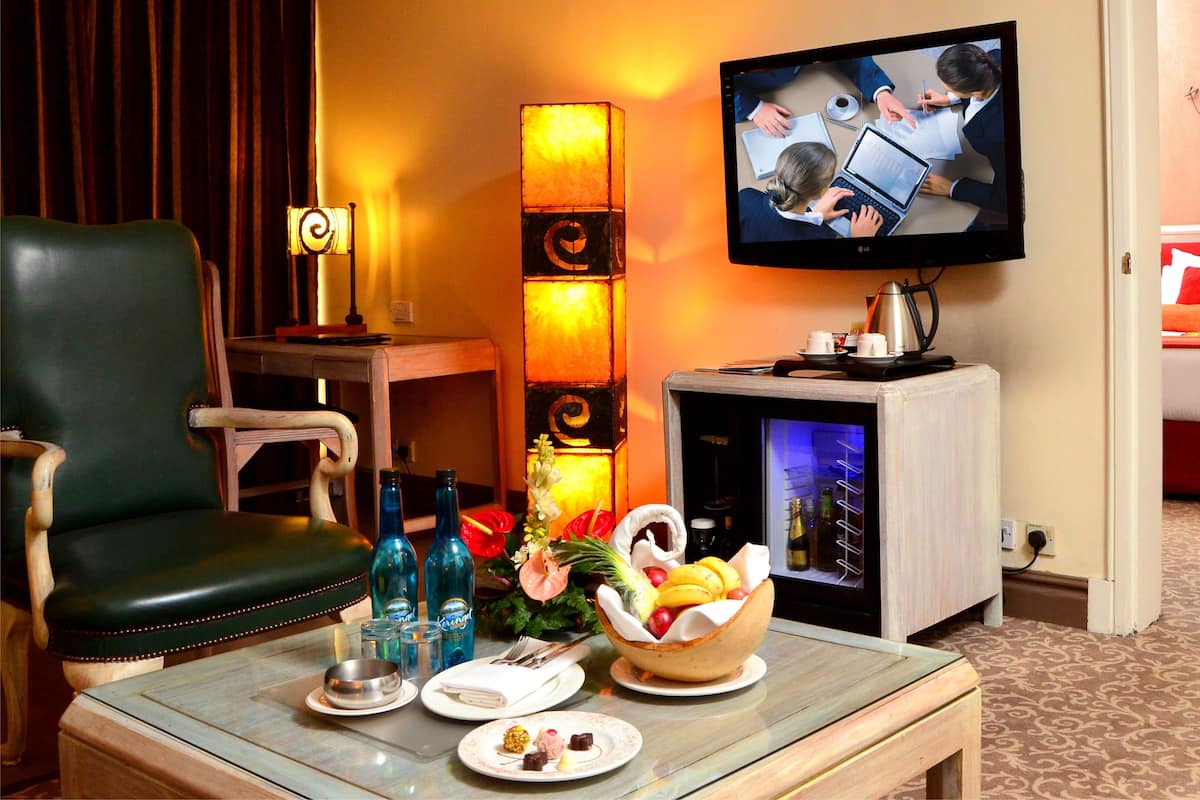 Executive Double Room | Living area | Flat-screen TV