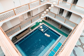 Indoor pool, seasonal outdoor pool, free pool cabanas, pool umbrellas