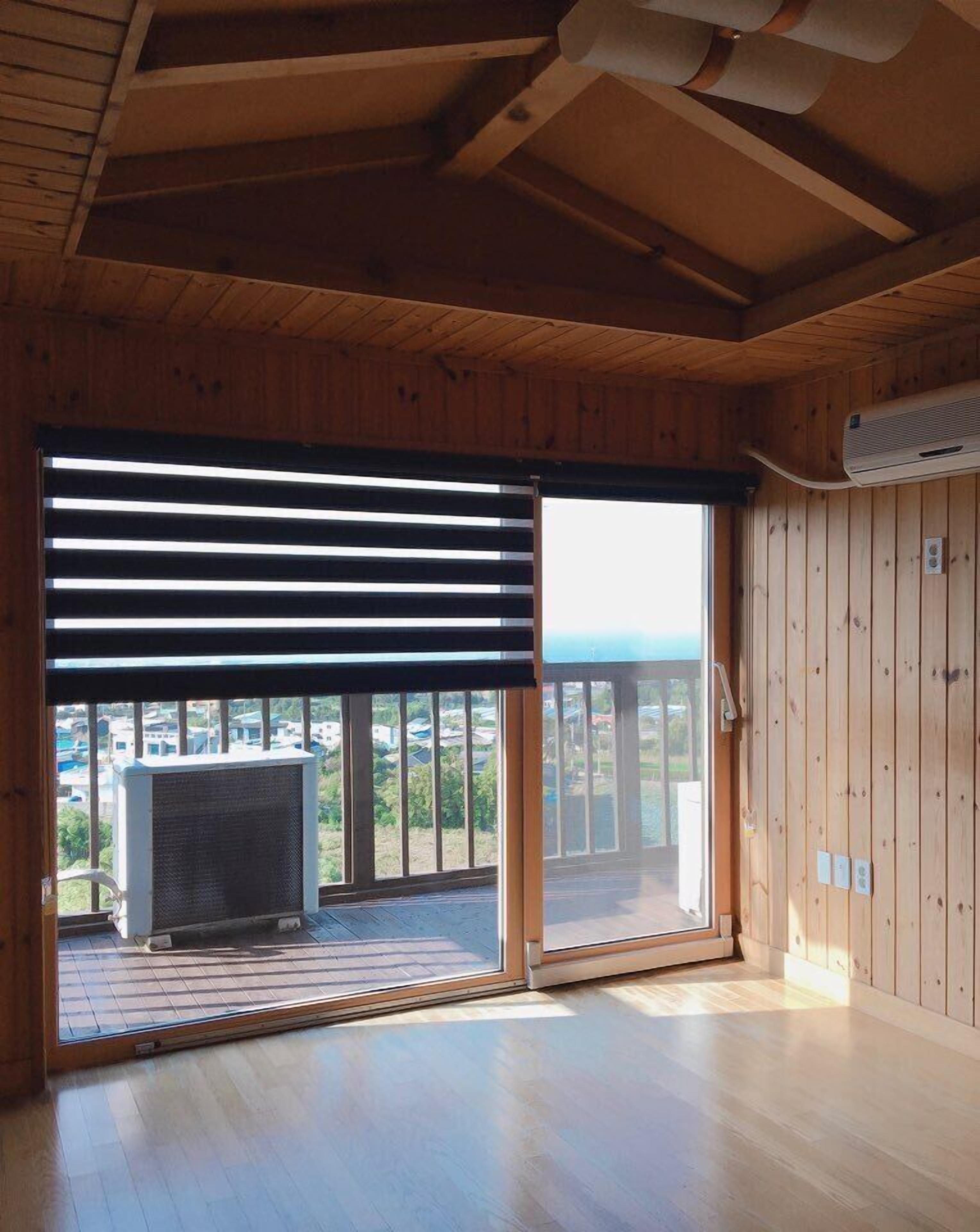 Deluxe Room, 2 Bedrooms | Living area | Flat-screen TV