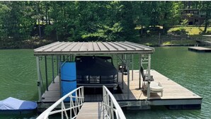 Property grounds - 295 is 5 minutes from dam with boat launch and tritoon boat for rent. (Jasper)