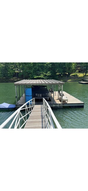 Property grounds - 295 is 5 minutes from dam with boat launch and tritoon boat for rent. (Jasper)