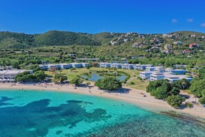 On the beach, sun-loungers, beach towels, beach bar