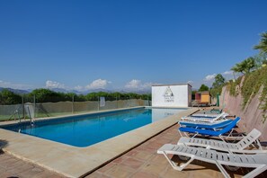 Seasonal outdoor pool, pool umbrellas, sun loungers