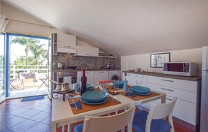 Fridge, stovetop, dishwasher, coffee/tea maker