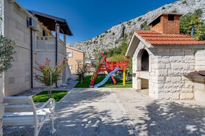 Children's area - VILLA RUNJE- STONE BEAUTY with heated pool, jacuzzi, amazing view on Split & sea (Gornje Sitno)