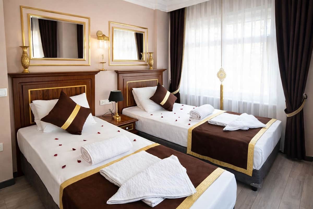 Familien-Suite, 2 Schlafzimmer, Nichtraucher, Stadtblick | Hochwertige Bettwaren, Betten mit Memory-Foam-Matratzen