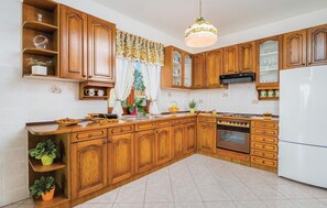 Fridge, coffee/tea maker, cookware/dishes/utensils