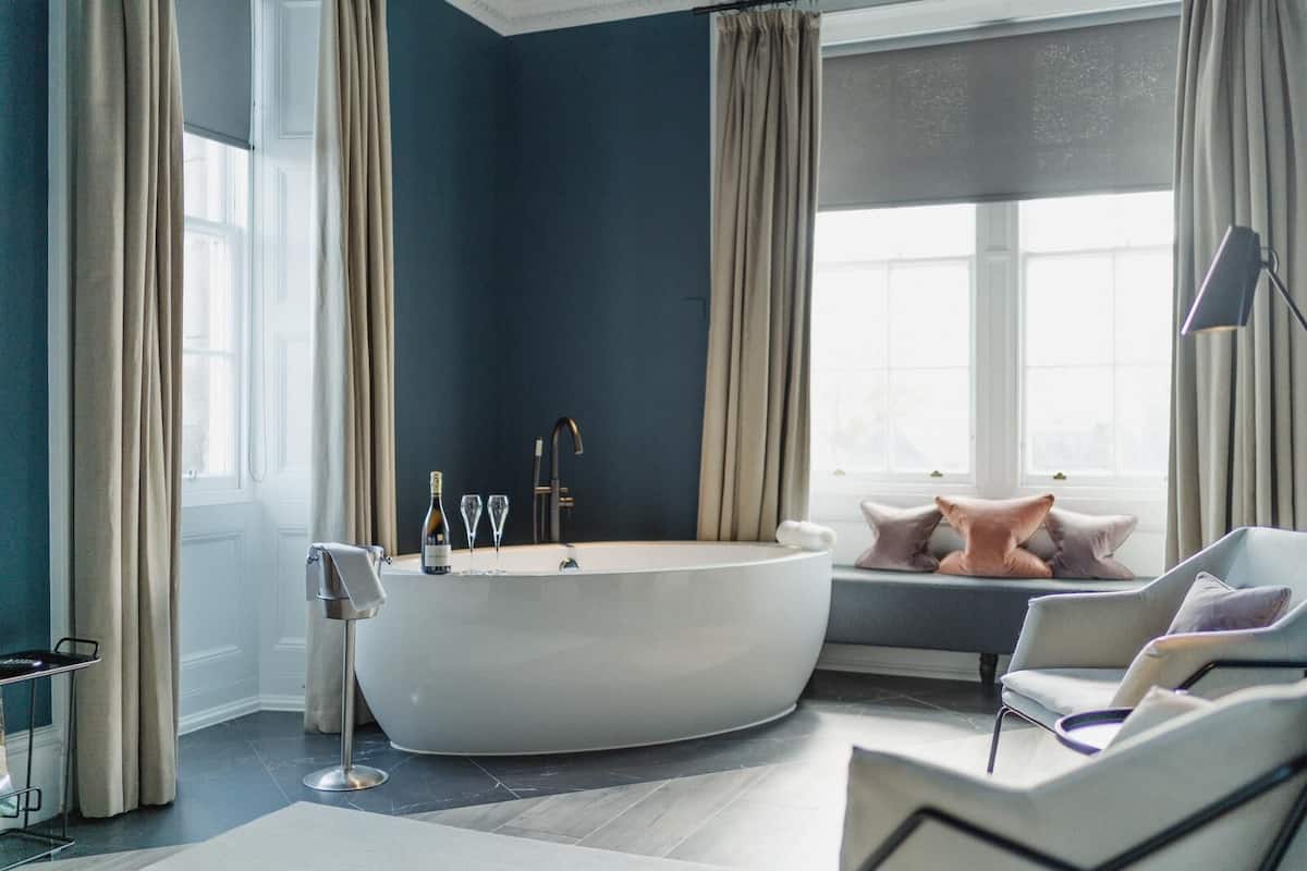 suite (the ridge) | bathroom | shower, designer toiletries, hair dryer, dressing gowns