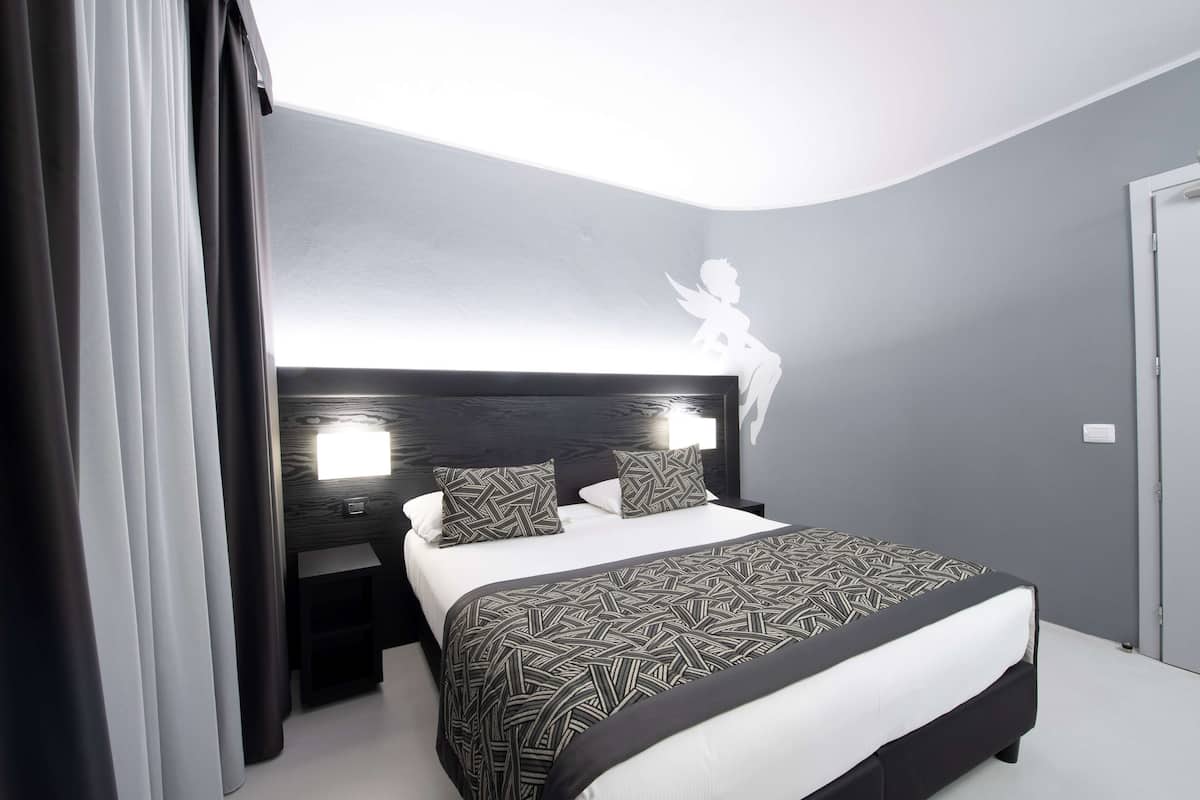 Family Room, Multiple Beds, Non Smoking | 1 bedroom, minibar, in-room safe, individually decorated