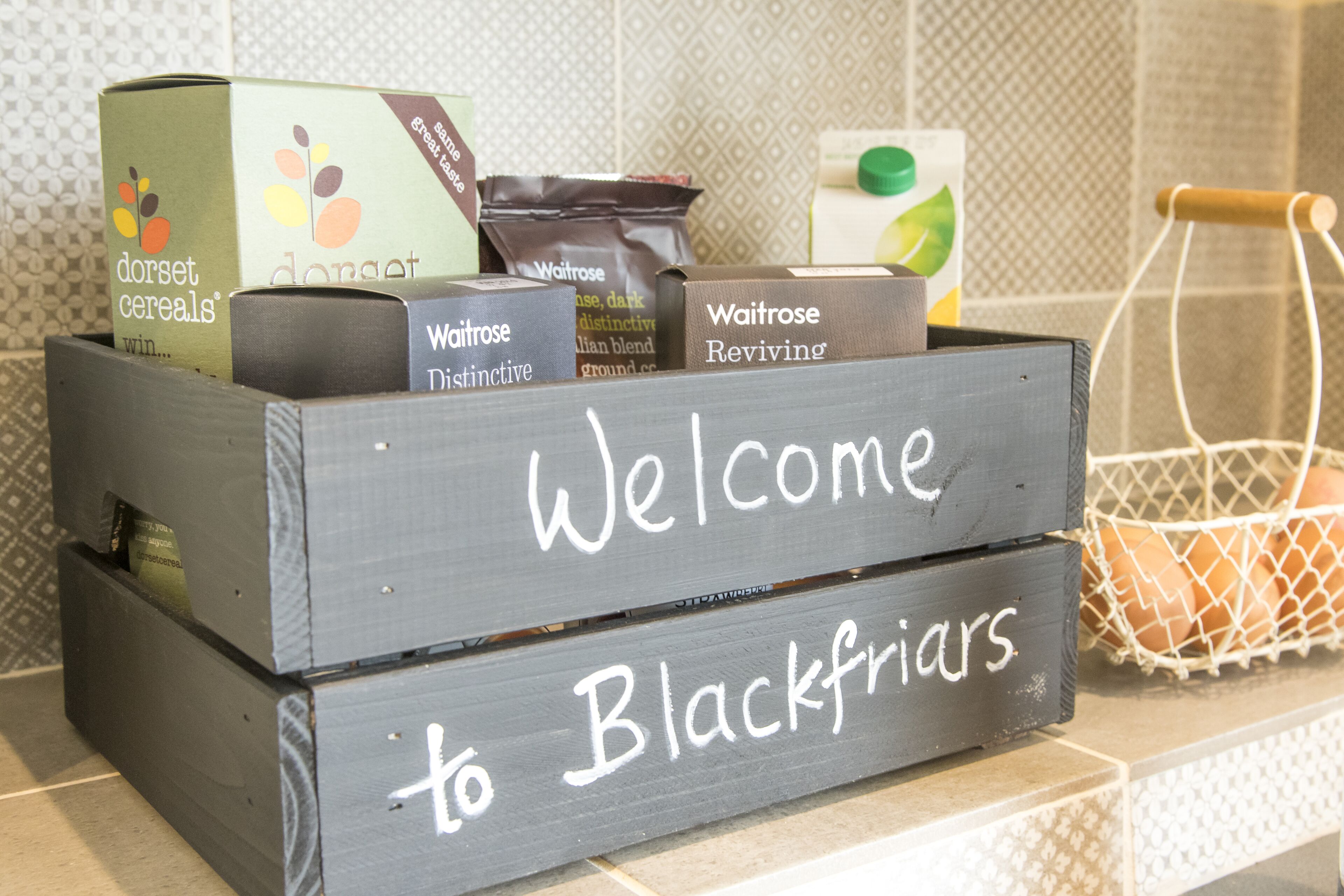A wooden crate with a sign that reads "Welcome to Blackfriars."