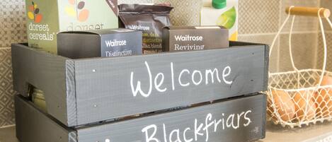 A wooden crate with a sign that reads "Welcome to Blackfriars."