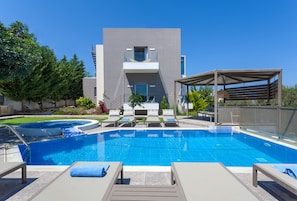 Outdoor pool, pool umbrellas, pool loungers