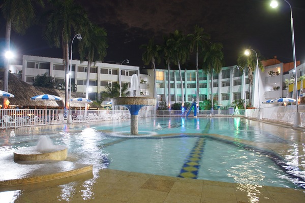 Outdoor pool, open 7:00 AM to 9:00 PM, pool umbrellas, sun loungers