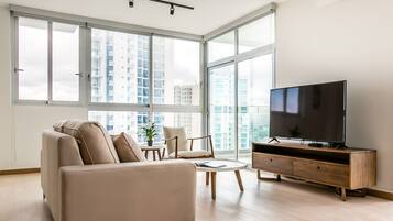 Apartment, 2 Bedrooms | Living area | Flat-screen TV