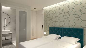 Un dormitorio moderno con una cama grande, un vestidor y un baño con cabina de ducha de vidrio.