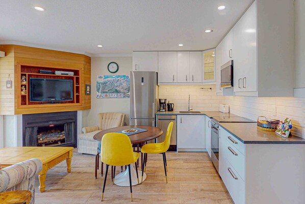 Fridge, microwave, oven, stovetop - Newly renovated slope-side condo on Perfection ski run w/ shared pool & hot tub (Big White Mountain)