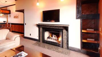 Flat-screen TV, fireplace