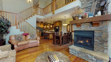 TV, fireplace, books, stereo