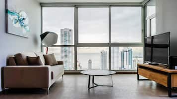 Apartment, 3 Bedrooms | Living room | Flat-screen TV