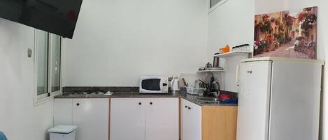 Fridge, microwave, stovetop, electric kettle
