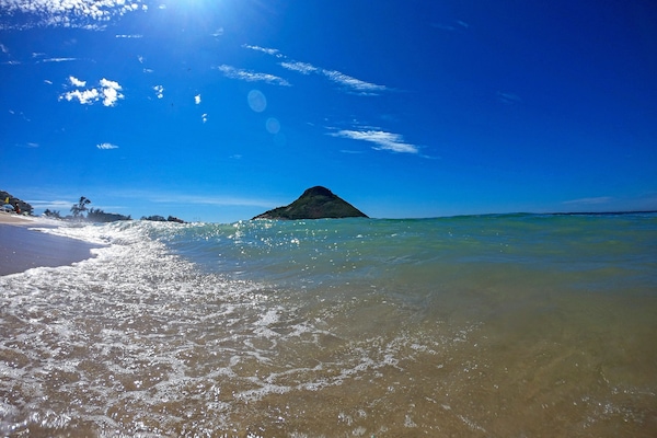 Beach nearby, white sand, beach yoga, beach volleyball