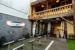 Enjoy beachfront living with a bar, kitchen, and surfboard storage.