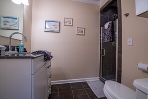 Combined shower/tub, hair dryer, towels, soap