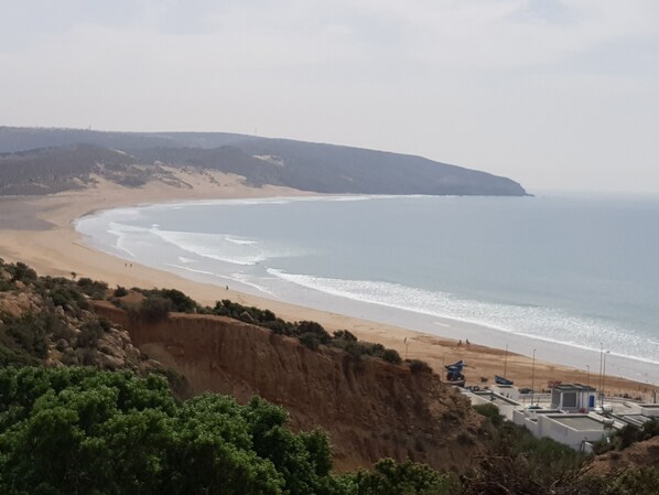 Plage, chaises longues