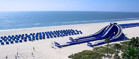 On the beach, sun loungers