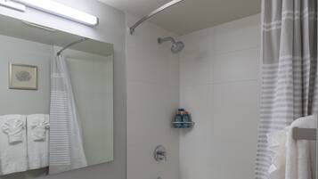 Combined shower/tub, hair dryer, towels, soap