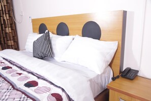 Down duvets, memory-foam beds, minibar, individually decorated