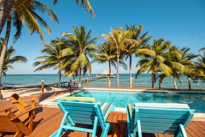 Ocean view condo at beachfront complex with AC, free WiFi, & pool