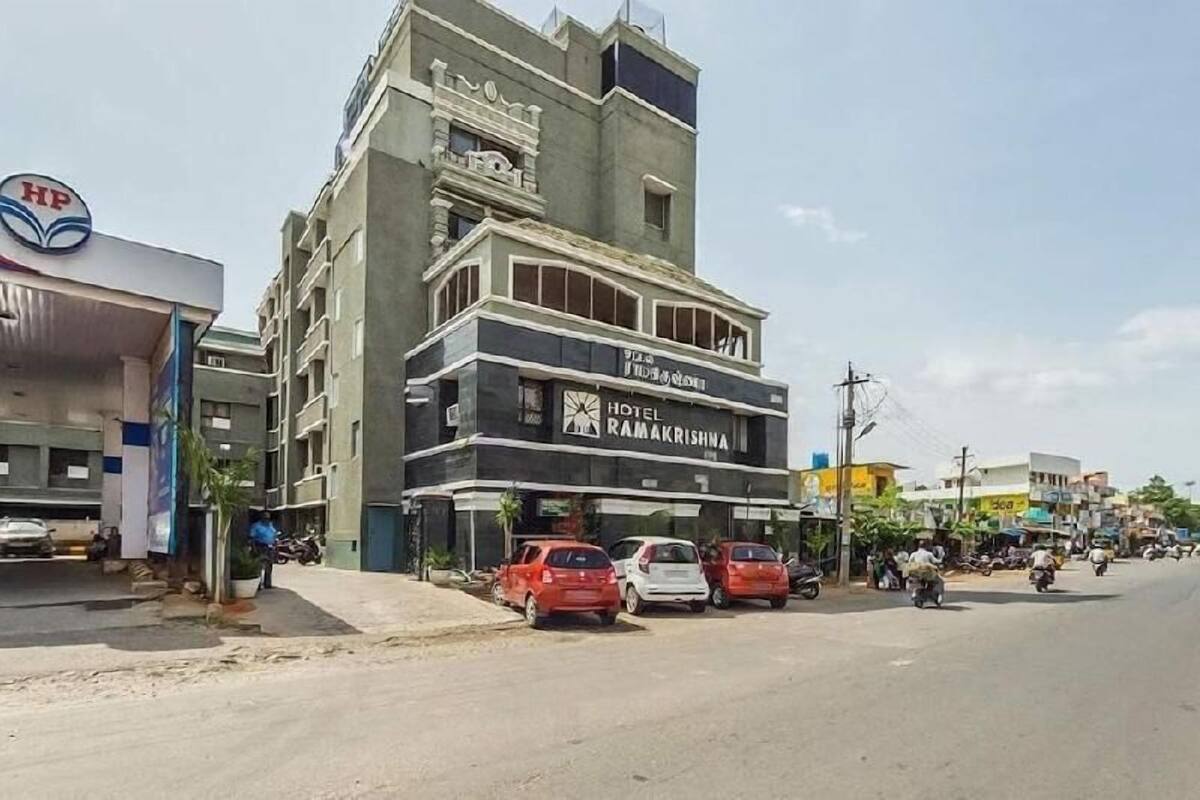 A multi-story building with a sign for 'Hotel Ramakrishna.'