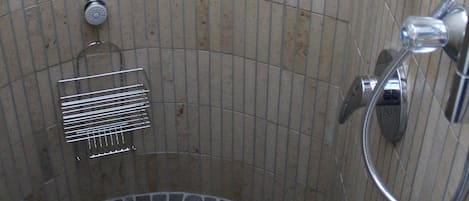 Bathtub, hair dryer, towels, soap