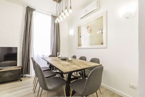 Apartment, 3 Bedrooms | Living area | Smart TV