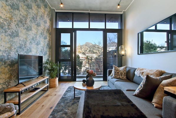 Luxury Apartments, 1 Bedroom | Living area | Smart TV, Netflix, streaming services - ITC Docklands (Cape Town)