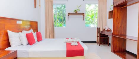 Premium bedding, in-room safe, individually decorated