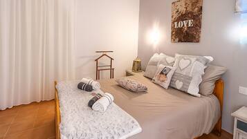 1 habitación, tabla de planchar con plancha, wifi gratis y ropa de cama