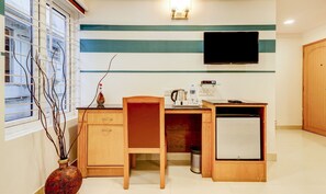 Chambre Premium | Bureau, fer et planche à repasser, Wi-Fi gratuit, draps fournis